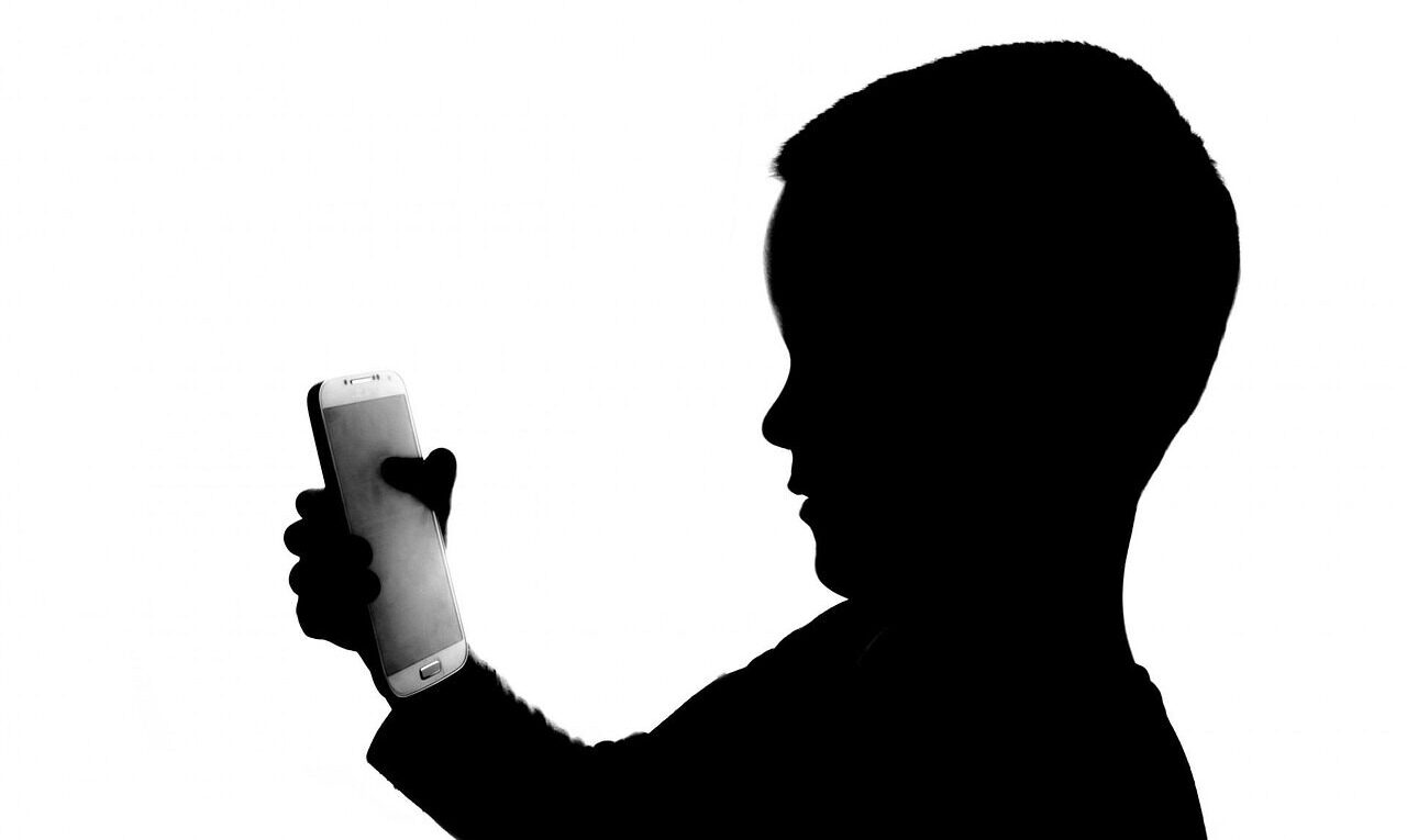 people, white, phone, holding, kid, player, side view, profile, isolated, fun, smart phone, boy, happiness, telephone, studio, shadow, playing, phone call, mobile phone, video game, portrait, smile, studio shot, smart phone, smart phone, smart phone, smart phone, shadow, phone call, phone call, phone call, phone call, phone call, mobile phone, video game, video game